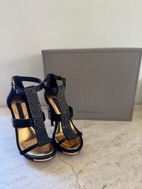 BCBGMaxAzria Black Crystal-Embellished T-Strap Heels with Gold Insole